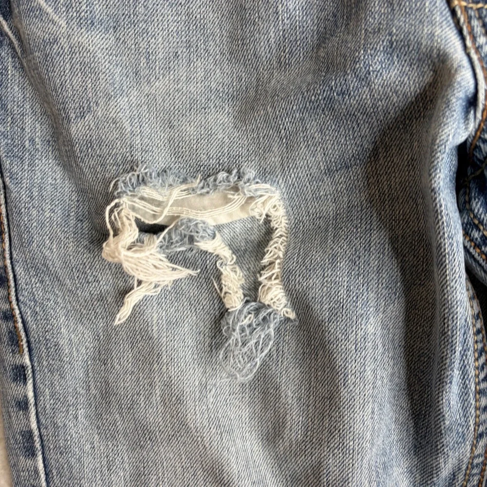 Wrangler 20X Vintage Y2K Distressed Light Wash bootcut Jeans 28x33